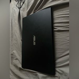 A pc/laptop Asus black hood shape